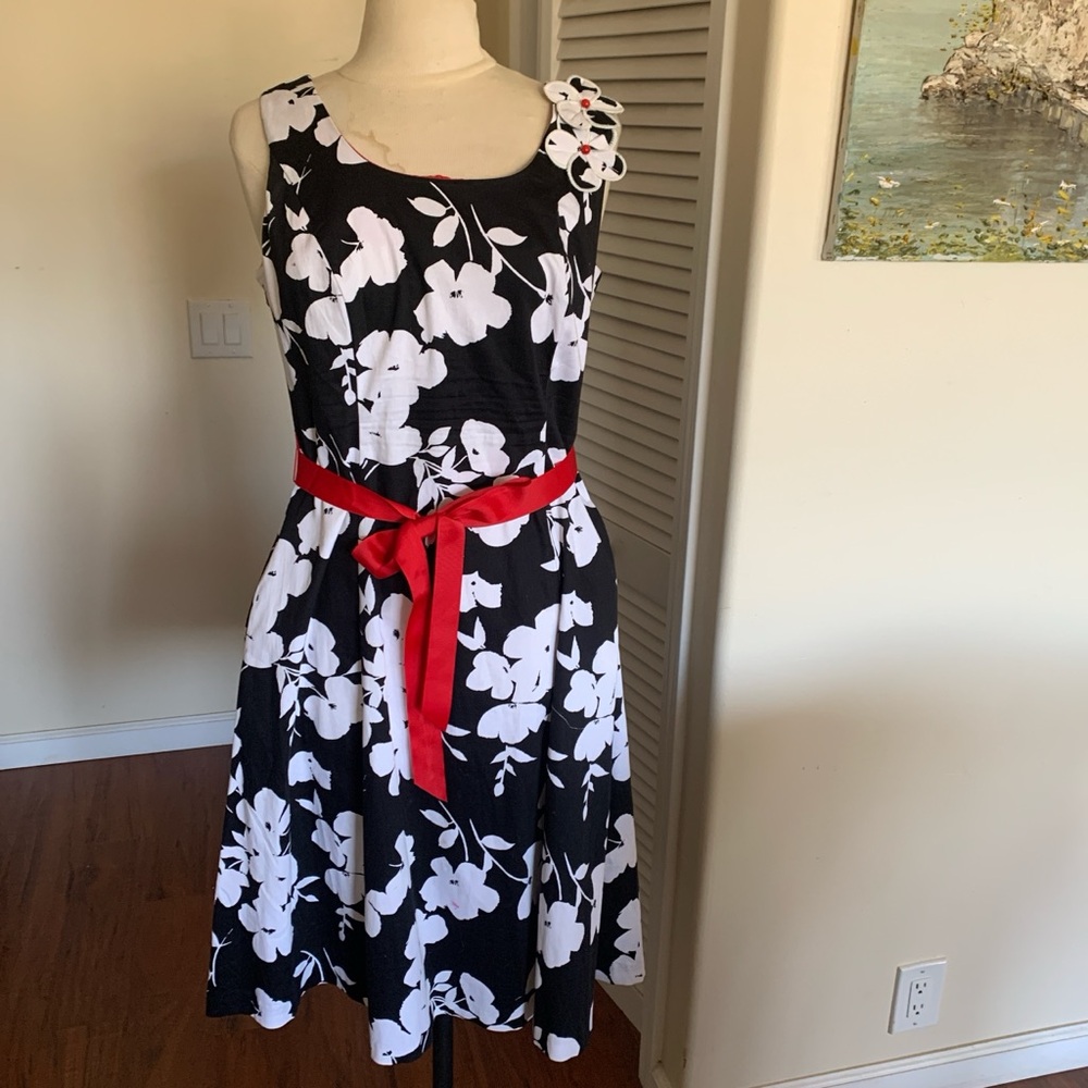 Amanda Lane Black and White Floral Midi Dress with Red Details, has pockets